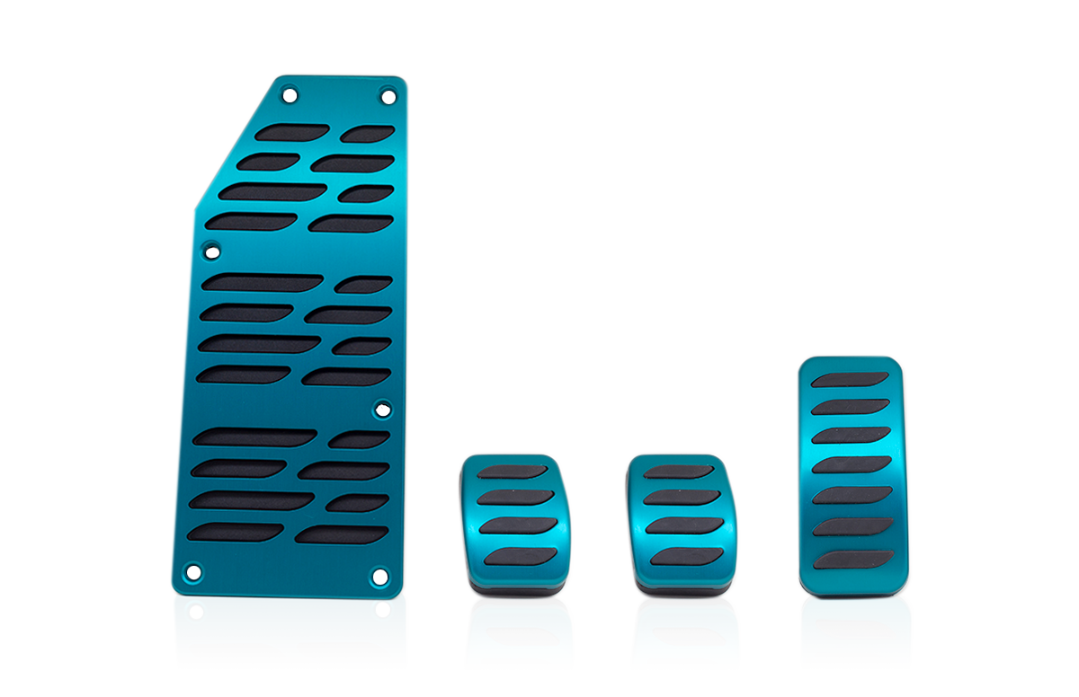 Kit pedali sportivi in alluminio anodizzati turchese e con inserto antiscivolo in elastomero nero.